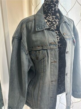 Levi's Washed Blue Denim Trucker Jacket with Stud Details